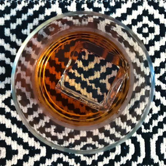 Clear ice in Whiskey from Overhead